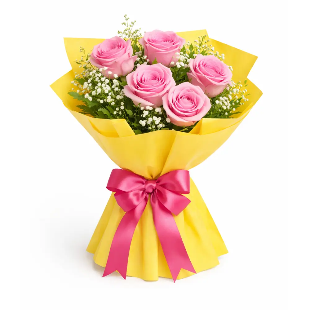 pink rose bouquet with yellow wrapping